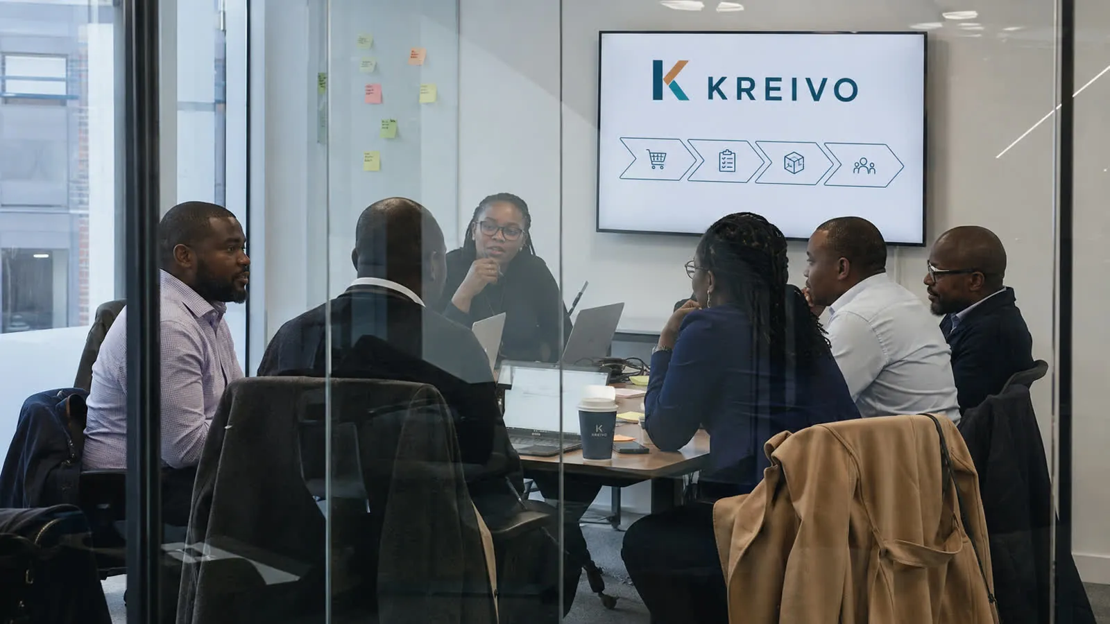 Kreivo strategy session in a branded meeting room